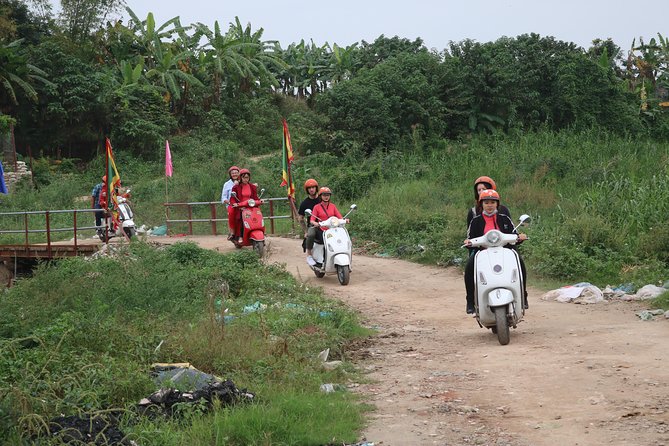 Hanoi Vespa Countryside Tour With Female Ao Dai Riders Half Day - Leaving Hoan Kiem Lake for the Red River Delta