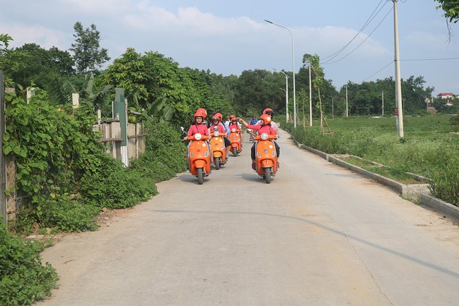 Hanoi Vespa Full Day City & Countryside with Female Ao Dai Riders - Four hours around Co Loa Citadel and rural roads