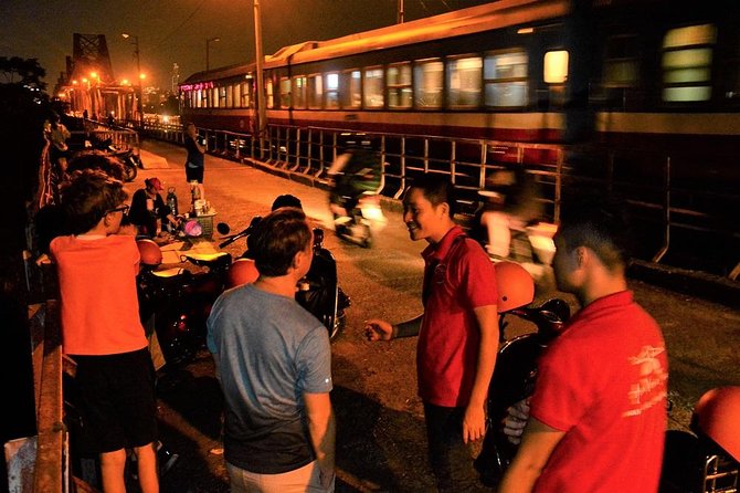 Hanoi Vespa Tours: Hanoi After Dark Vespa Food Tours - Hanoi Opera House and the first family-run food stop