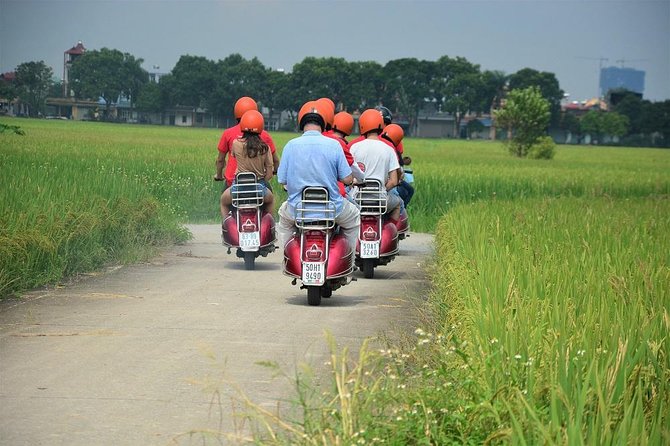 Hanoi Vespa Tours: Hanoi Vintage Vespa Tours Countryside - Leaving Hanoi across Long Bien Bridge