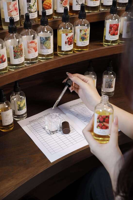 Hanoi: Vietnam Scents Perfumery Class - Blending the final bottle at the perfumer station