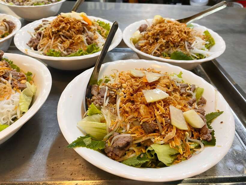 Hanoi: Vietnamese Street Food Tour with Egg Coffee - Banh mi, beef noodle salad, and the lessons between bites