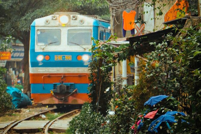 Hanoi Walking Street Food Tour with Train-Street Visit - Starting at 38 Bat Su Street