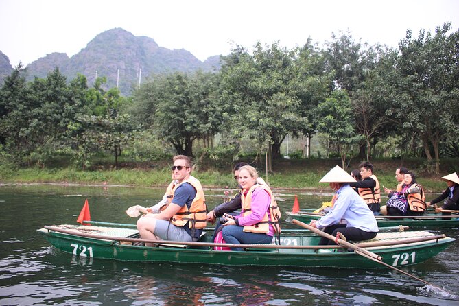 Hidden Ninh Binh Luxury Full Day Group Tour (Tam Coc - Hoa Lu) - Pickup, meeting point, and extra costs
