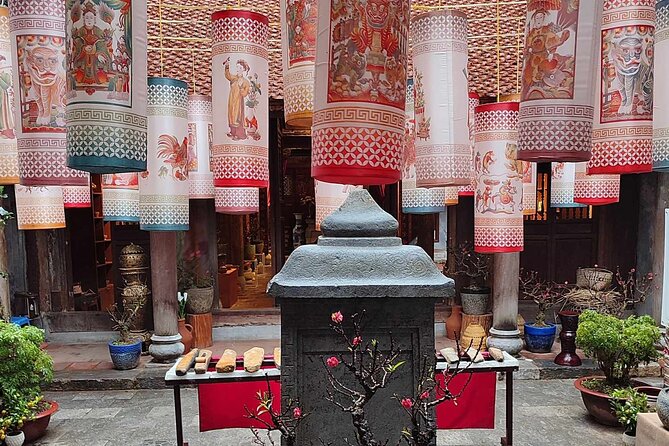 Highlights and Secrets of Hanoi Old Quarter Through Train Street - The Old City Gate and an everyday market view