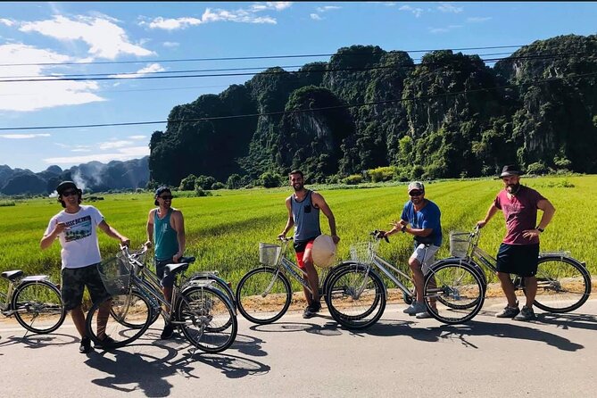 Hoa Lu - Tam Coc - Mua Cave 1 Day with Cycling, Hiking, Lunch - Climbing the 500 steps at Mua Cave