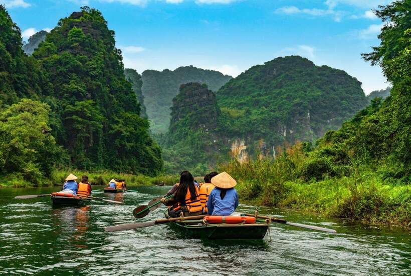 Hoa Lu, Tam Coc, & Mua Cave Day Trip with Lunch & Limousine - Leaving Hanoi in a limousine bus