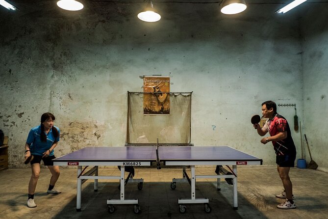 Into the Thieves Market Hanoi Photo Tour - The unexpected table-tennis hall stop