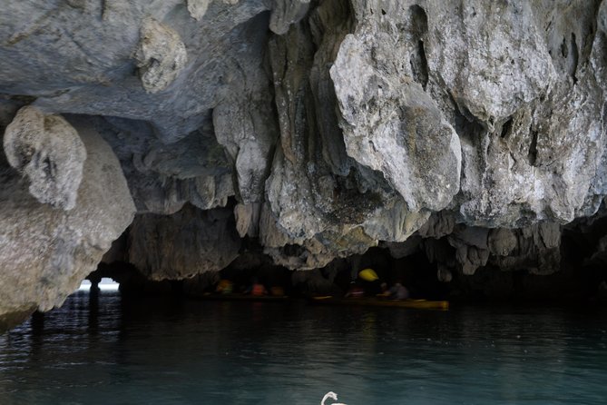 Most favorite full day boat tour with kayaking in Lan Ha bay, Ha Long bay - Kayaking into the dark-bright caves