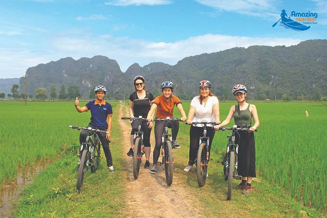 Mua Cave - Tam Coc - Bich Dong Day tour with transfer, local family & bike - Climbing Mua Cave for the wide Ninh Binh view