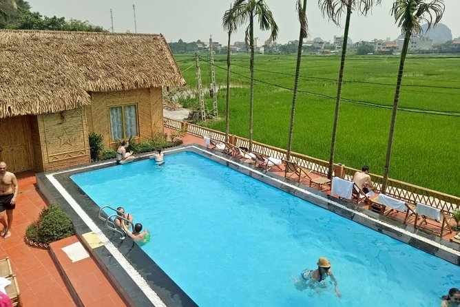 Ninh Binh Daily Tour: Hoa Lu -Mua Cave -Tam Coc- Bike-Swimming with Sunset Party - What the $79 price covers