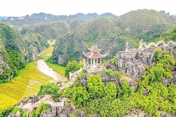 NINH BINH MEMORABLE DAY: Hoa Lu, Mua Cave, boat trip Tam Coc, Trang An optional - Tam Coc by sampan, with cliffs and caves at water level