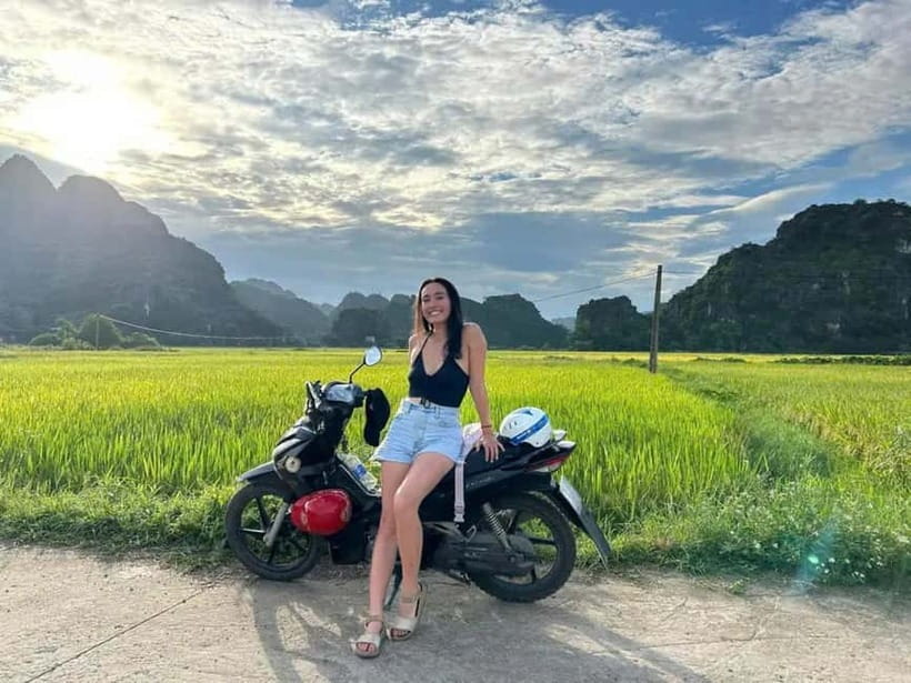 Ninh Binh Sunset Motorbike: Mua Cave, Coi Khe & Hoa Lu Town - Climbing Mua Cave for the main view