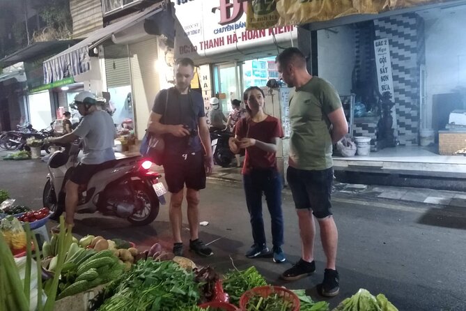 Old Quarter Hanoi Street Foods and Heritage Road Tour by Walking - Starting with happy water on Tran Nhat Duat Street