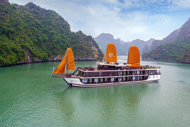 Peony Cruise 5</em> Lan Hạ Bay 2 days 1 night with 2 ways transfer – Why Lan Ha Bay makes this cruise different’ /></p>
<p><p>Ha Long Bay is Vietnam’s famous limestone bay, but Lan Ha Bay offers a slightly quieter setting and a less familiar route. Peony Cruise combines both names in its itinerary, beginning around Tuan Chau and Ha Long Bay before continuing toward Lan Ha Bay and Tra Bau.</p>
</p>
<p><p>That route matters because you are not spending both days on the same short stretch of water. The scenery changes as the ship moves between the better-known Ha Long area and Lan Ha Bay. You can watch the bay through the cabin windows, from the ship’s shared areas, or outside when conditions allow.</p>
</p>
<p><p>The cruise description makes a point of its special route, but you should keep expectations sensible. This is still a popular overnight cruise area, not a private wilderness trip. The appeal is the mix of dramatic limestone scenery, a comfortable cabin, and a route that feels less standard than a basic Ha Long Bay day cruise.</p>
</p>
<p><p>For me, the biggest advantage of staying overnight is time. A day trip from Hanoi must fit transport, port procedures, sightseeing, and the return journey into a single day. Here, you have an evening and an early morning on the bay, when the light can be softer and the pace slower.</p>
</p>
<div class="twil" style="margin: 20px 0; padding: 15px 0;"><p>More nights out on the bay:</p><ul style="margin: 10px 0; padding-left: 0; list-style: none;"><li style="margin: 0 0 12px 0; padding: 0 0 12px 0; border-bottom: 1px solid #DEE8E7; line-height: 1.4;"><a href="https://thehanoitraveler.com/featured-all-inclusive-overnight-halong-cruises-many-options/">Featured: All-Inclusive OVERNIGHT Halong Cruises – many options</a><br><span style="font-size: 0.82em; color: #555;"><span style="color: #F2B62B;">★</span> 4.5 &nbsp;&middot;&nbsp; 3,490 reviews</span></li><li style="margin: 0 0 12px 0; padding: 0 0 12px 0; border-bottom: 1px solid #DEE8E7; line-height: 1.4;"><a href="https://thehanoitraveler.com/top-tier-overnight-ha-long-bay-cruise-5-star-balcony-cabin-2d1n/">Top Tier: Overnight Ha Long Bay Cruise 5-Star, Balcony Cabin-2D1N</a><br><span style="font-size: 0.82em; color: #555;"><span style="color: #F2B62B;">★</span> 5.0 &nbsp;&middot;&nbsp; 2,251 reviews</span></li><li style="margin: 0; padding: 0; border-bottom: none; line-height: 1.4;"><a href="https://thehanoitraveler.com/2-days-1-night-halong-bay-discovery-cruise-from-hanoi/">2-Days, 1-Night Halong Bay Discovery Cruise from Hanoi</a><br><span style="font-size: 0.82em; color: #555;"><span style="color: #F2B62B;">★</span> 5.0 &nbsp;&middot;&nbsp; 1,156 reviews</span></li></ul></div><h2 id="leaving-hanoi-by-limousine-bus">Leaving Hanoi by limousine bus</h2>
<p> Lan Hạ Bay 2 days 1 night with 2 ways transfer – Leaving Hanoi by limousine bus’ /></p>
<p><p>The day begins early. Pickup is listed between 8:30 and 8:50 from hotels in Hanoi’s Old Quarter, or from No. 34 Hoa Ma Street in Hai Ba Trung. The vehicle is air-conditioned, and the transfer is included in the price.</p>
</p>
<p><p>This is useful if you are staying in the Old Quarter and want one booking to cover the move from Hanoi to the port. You do not need to work out a separate taxi, private car, or bus connection. If your hotel is outside the stated pickup area, you should confirm the meeting point before booking.</p>
</p>
<p><p>The transfer details deserve a little attention. The published meeting-point information also shows a start time of 12:00 am, while the day-one schedule gives the practical pickup window of 8:30 to 8:50. That is an obvious listing mismatch, so I would rely on the 8:30 to 8:50 pickup instruction and confirm the exact time with the operator.</p>
</p>
<p><p>One guest found the pickup and drop-off plan unclear until the company called the day before. That is not a serious problem, but it is a useful warning. Keep your phone available before departure, and ask specifically where you will be collected and where you will be returned in Hanoi.</p>
</p>
<h2 id="boarding-peony-cruise-around-tuan-chau">Boarding Peony Cruise around Tuan Chau</h2>
<p><img width="669" height="446" decoding="async" src=