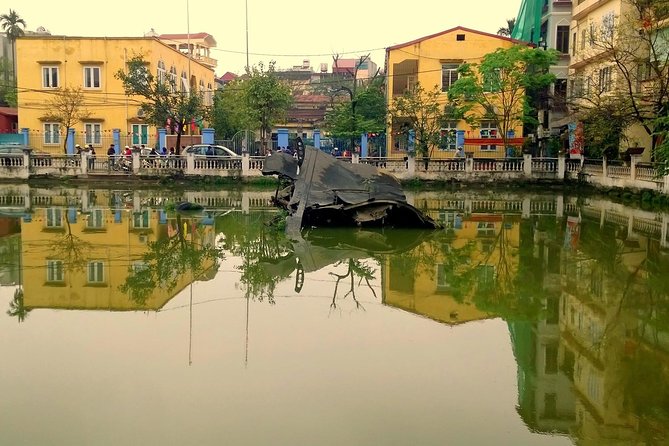 Private Hanoi Motorbike Sightseeing and Food Tour - Old City Gate and railway street
