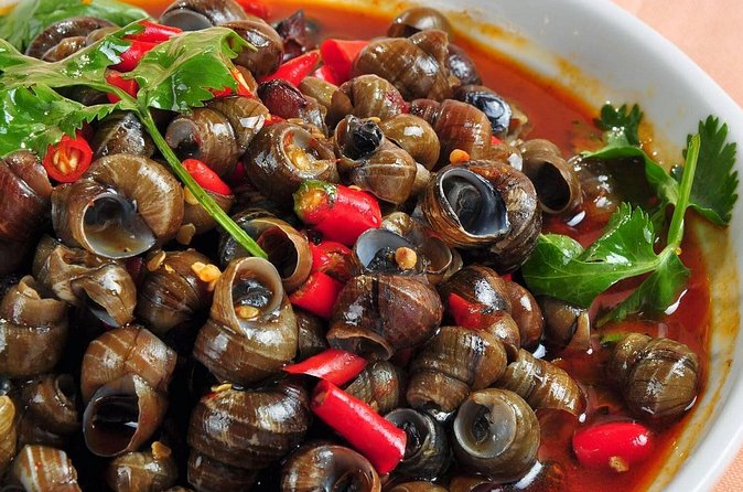 Private Hanoi Street Food Tour with MICHELIN Highlights - Meeting your guide at Ha Food Tours