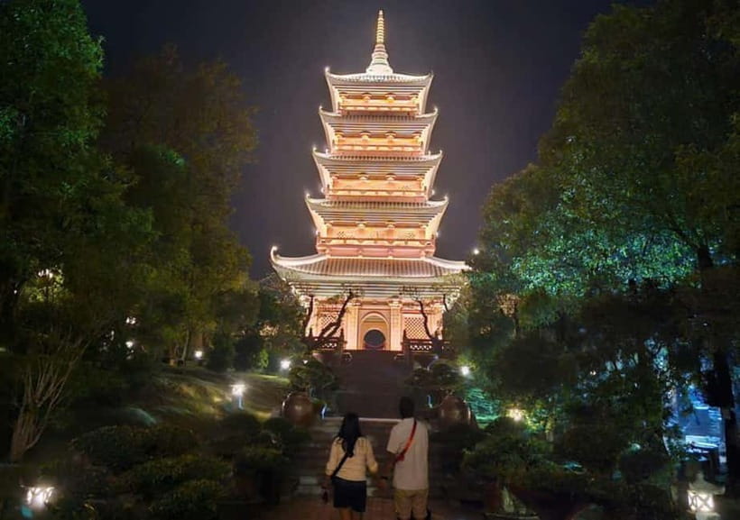 Sacred Nights at Bai Dinh Pagoda: A Spiritual Escape - Quan Am Hall and a statue linked with compassion