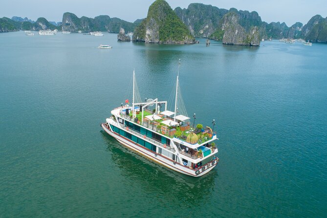 Sweetness Cruise Ha Long Bay: Caves, Kayaking, Swimming & Lunch - Kayaking or bamboo boat at Luon Cave