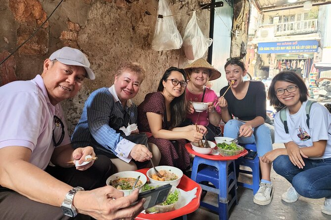 TASTE OF HANOI - walking street food adventure - A banh mi break near Hang Ma