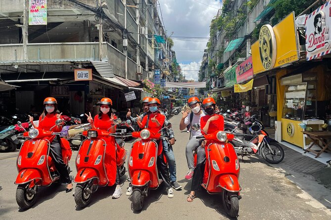 The insider's Hanoi + Train Street 4,5 Hours Female Ao Dai Riders - Why seeing Hanoi by Vespa makes sense