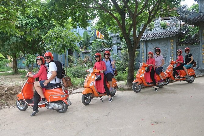 The insider's Hanoi + Train Street 4,5 Hours Female Ao Dai Riders - Returning through Hanoi and finishing in the Old Quarter