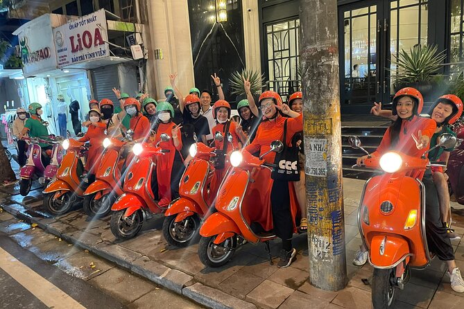 Vespa Female Ao Dai riders Night Street Food + See Train Street - Hanoi Opera House and the first major food stop