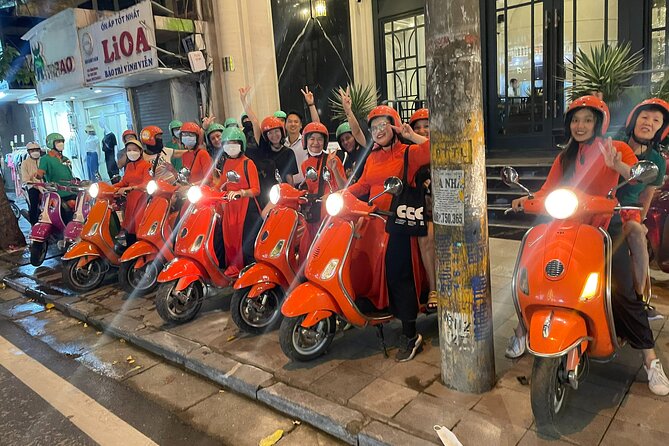 Vespa Female Ao Dai riders Night Street Food + See Train Street - 6 p.m. pickup and the Old Quarter start