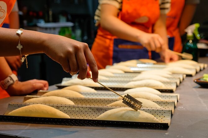 Vietnamese Bread & Brew: Banh Mi Baking Class & Specialty Coffee - Choosing meat or tofu and mixing the sauces